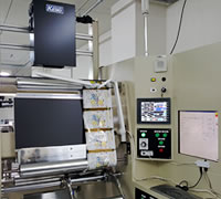 欠点検知機付小巻ロール巻替検品機
